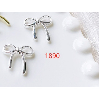 Lẻ 1 cái charm nơ màu bạc lẻ a
