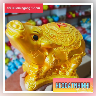 HEO ĐẤT TIẾT KIỆM LÊN HÌNH TRÂU TÀI LỘC CHẤT LIỆU THẠCH CAO VÀNG ĐẸP CHUẨN MÀU” C 27 R17 D30 cm”