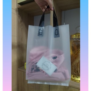 1kg túi hd trong mờ ép quai đen size 24x34