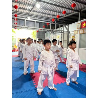 ( Free ship) VÕ PHỤC Karate phong trào vải Kaky dày ( KA1)