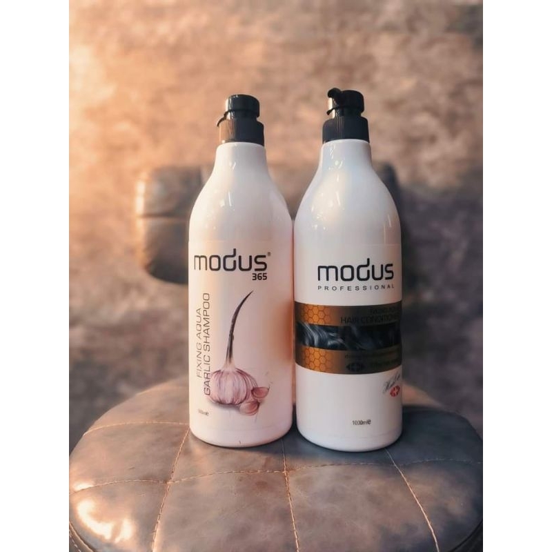 Dầu gội Modus tinh chất Tỏi đen