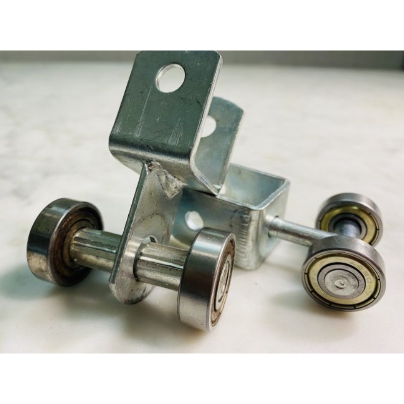 Bánh xe cửa xếp lùa, bánh xe lùa treo xoay 2 bi máng 3x4