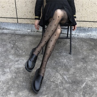 Quần tất họa tiết chấm bi