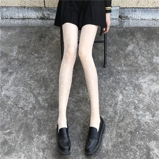 Quần tất họa tiết chấm bi
