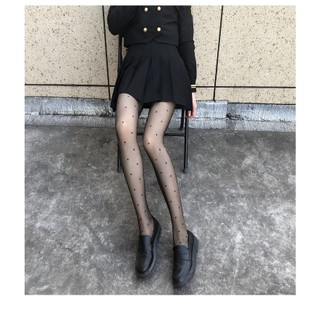 Quần tất họa tiết chấm bi