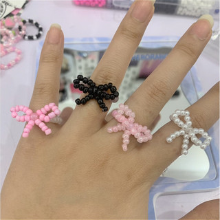 Nhẫn hạt cườm hình nơ - Chew