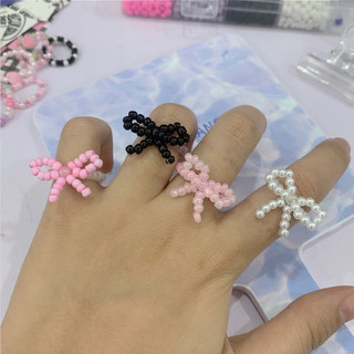 Nhẫn hạt cườm hình nơ - Chew