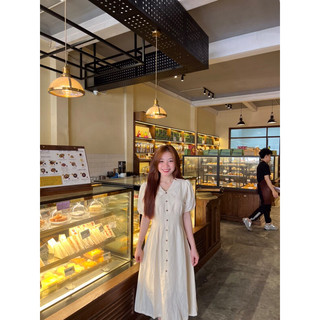 Đầm cổ bẻ khuy gỗ rúm eo