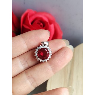 Mặt dây chuyền khắc 925 gắn viên đá đỏ 9.8 li cắt giác rất đẹp chưa rõ đá gì giống màu ruby mới 99%