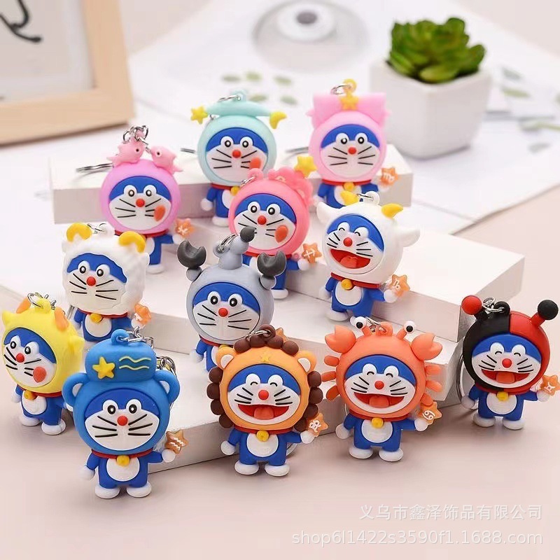 Móc khoá đô rê mon đội nón bảo hiểm siêu dễ thương