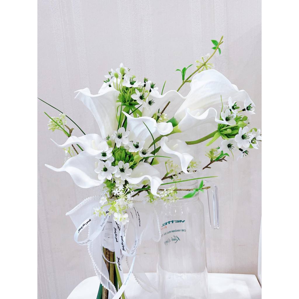 Hoa cầm tay cô dâu mix