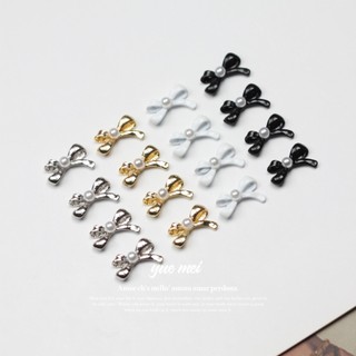 Charm nơ kim loại phủ sứ đính móng