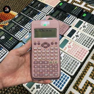 | máy tính cầm tay casio fx-580vnx hồng cũ chính hãng.