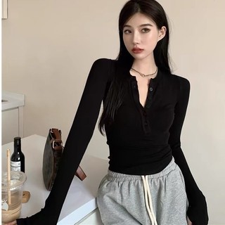 Áo kiểu tay dài phối nút ôm body