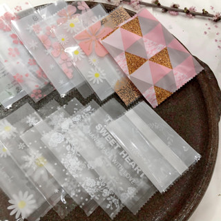 Set 100 túi bóng hàn miệng size 7x10 +cm trong mờ họa tiết đẹp đựng trà hoa thảo mộc set 100 túi bóng đựng bánh kẹo