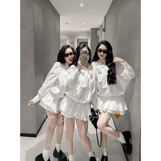 Đầm trắng nhún eo cột nơ tay dài