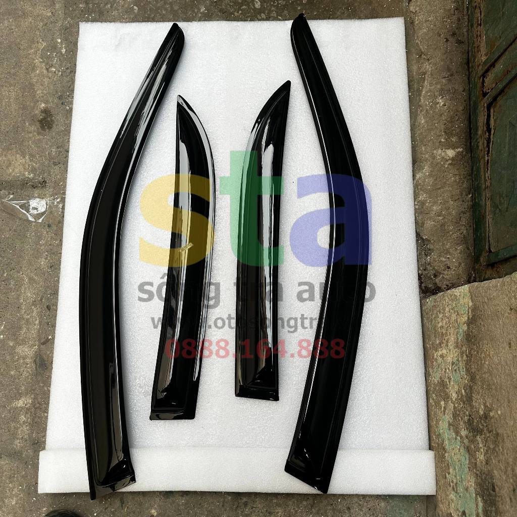 Vè che mưa Mazda 323. Dè mưa Mazda 323