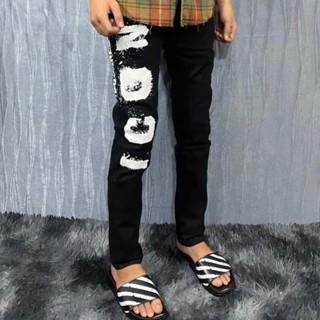 Quần jean nam ống ôm màu đen in chữ icon vải dày co giãn fom ôm boy phố quần bò ống bó nam