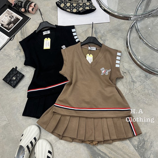 Sét áo gile Thome + chân váy xếp li