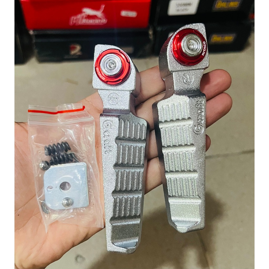 Gác chân sau takegawa tặng kèm ốc salaya, long đền cho các dòng xe