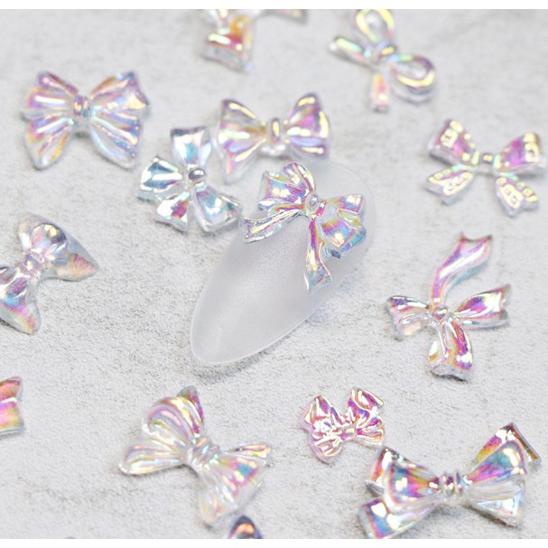 lẻ 1 cái charm nơ rang trí móng nhé ạ