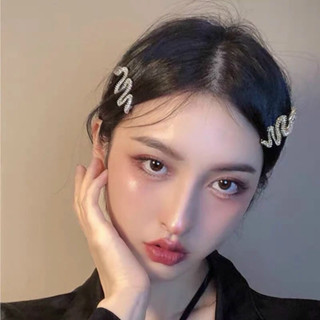 Kẹp tóc rắn sang chảnh đính đá blink