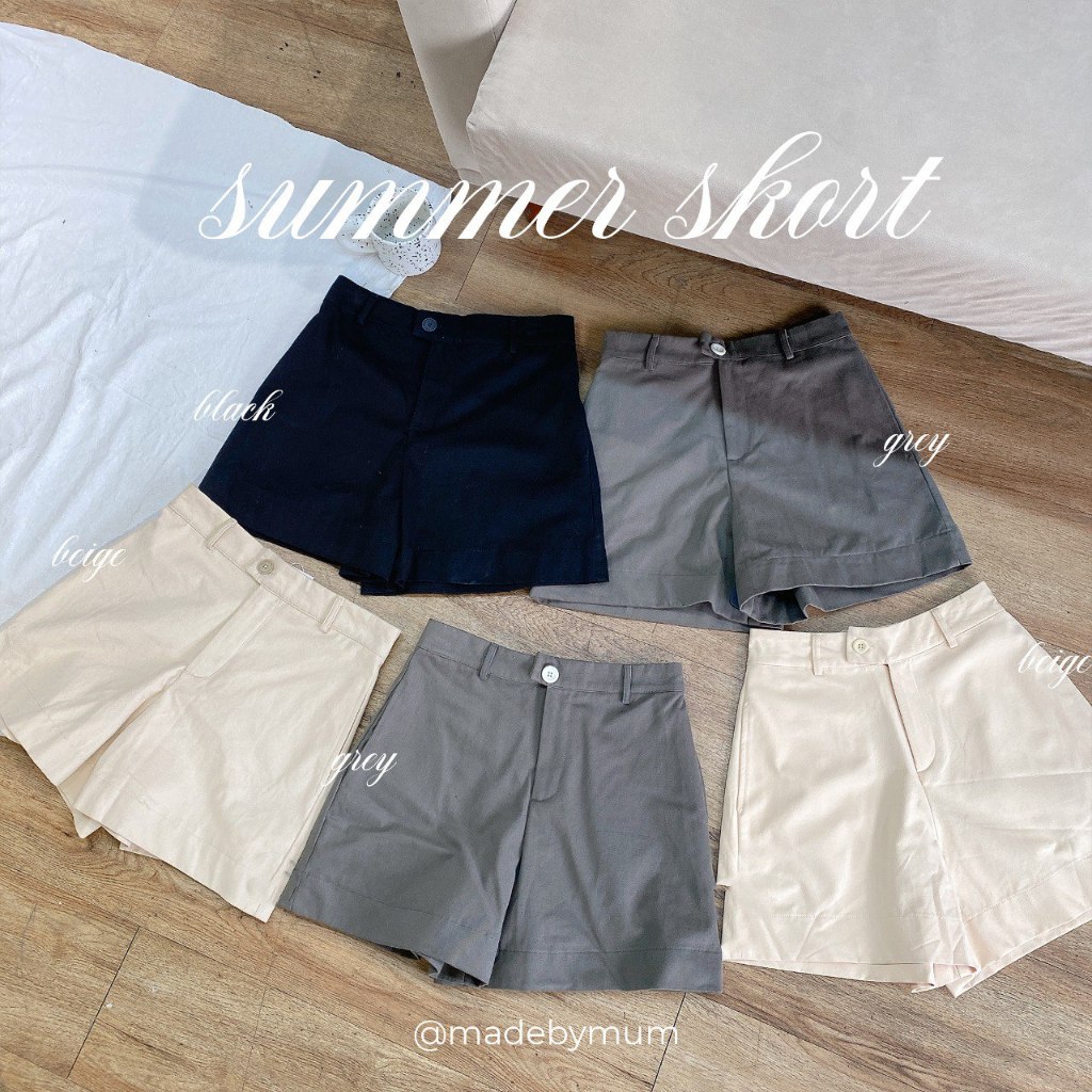 Quần short MADE BY MUM gài nút xéo