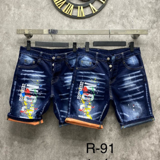 Quần short bò ngố nam DSQ xanh - đen mài cào xước chấm sơn in chữ Dsq2 dọc ống xắn gấu sơn