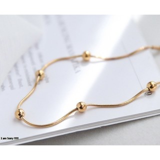 Lắc chân titan nữ dây mì tròn bi cách điệu màu vàng cực xinh- lcbiqcmi