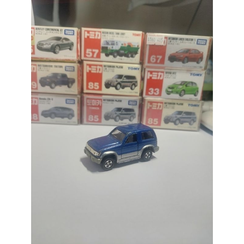 Xe mô hình Tomica Mitsubishi Pajero metal Top 1997 loose.
