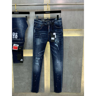 Quần jean bò nam DSQ slimfit wash xanh đậm loang bạc rách tua vá đùi gối in chữ D2 túi sau cao cấp QJ546P