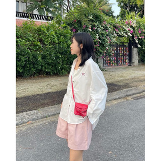 Áo sơ mi oversize hoạ tiết nơ