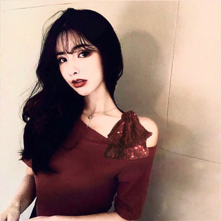 Áo thun gân đính nơ kim sa