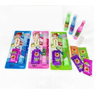 Kẹo bàn chải son đùn kèm kẹo dẻo hàm răng và kẹo nổ popping candy
