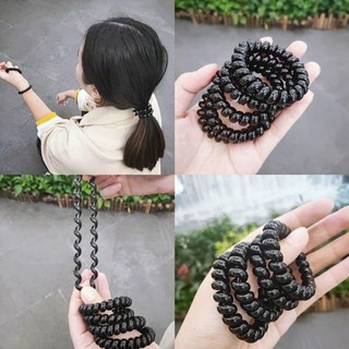 Cột tóc lò xo trong và đen cao cấp