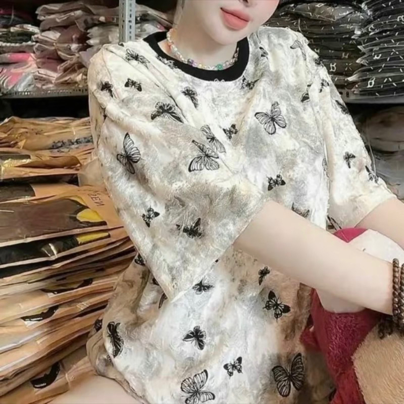 Ao phông rộng xước rách cotton hình buom in full