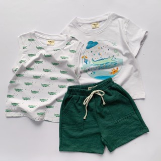 Samsoo 3 chi tiết cá sấu trắng gồm áo cộc áo balo và quần sooc xanh