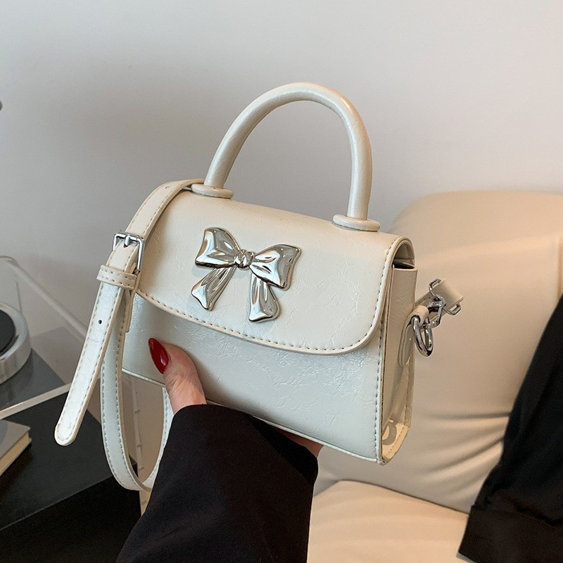 Túi xách nữ mini nơ bạc dễ thương cầm tay đeo chéo sang trọng quà tặng_ TDC013