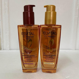 Hàng Đức Tinh dầu dưỡng tóc Loreal - Thiết kế chai dạng xịt rất dễ sử dụng