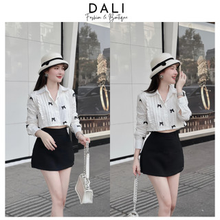 Set Bộ Áo Sơ Mi Dáng Croptop Đính Nơ Nhỏ + Chân Váy Chữ A Có Quần Trong Sang Chảnh