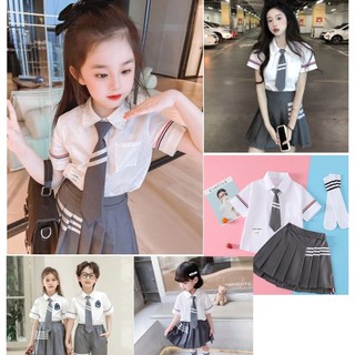 Set áo sơmi trắng chân váy xếp li phối kẻ phong cách học sinh hàn quốc B0052 cho bé size nhỡ đại 5-10T