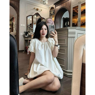 Đầm kem tay bồng dáng bí