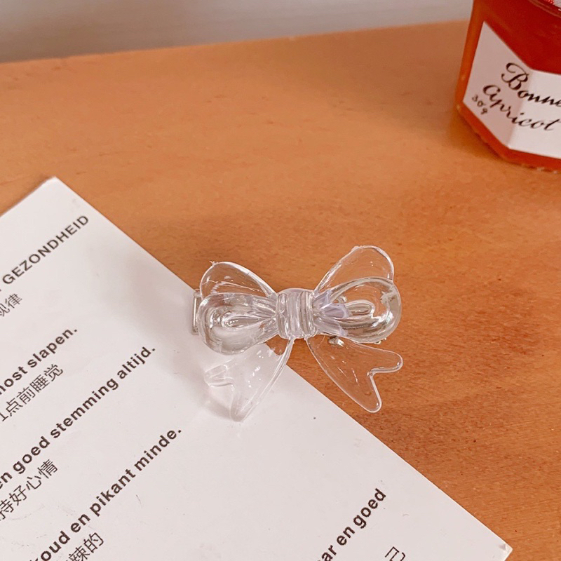Kẹp tóc mini charm nơ trong suốt