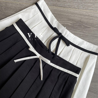 Chân váy xếp ly ngắn