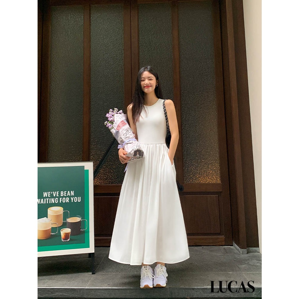 Váy cổ tròn khuyết tay dáng a dài basic