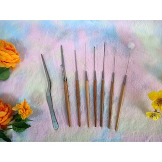 1 Cây Ráy tai cán Gỗ Vàng trong bộ ráy tai