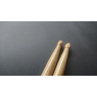 Dùi trống nặng, đầm, chắc loại dài
