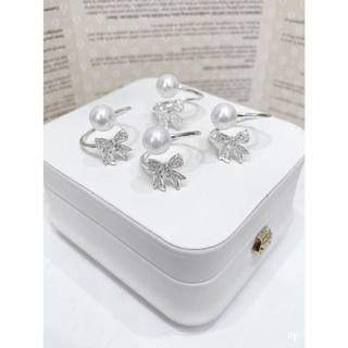 Nhẫn nơ bạc gắn trai