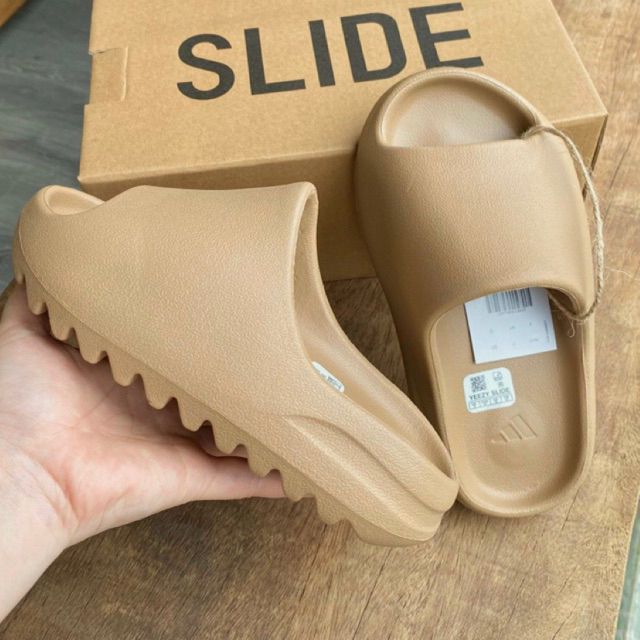 Dép đúc YEEZY SLIDE Nam Nữ sandal xăng đan bản vân nhám 2023 5cm dập logo và form chuẩn full size chất xịn chống thấm