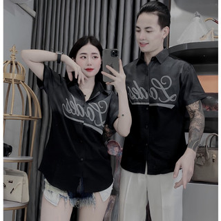 Áo sơ mi ngắn tay vải lụa mat co dãn vừa phối màu đen trắng trẻ trung cá tính.